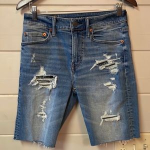 American Eagle Outfitters Denim Shorts with Distress over Patches Size 28.